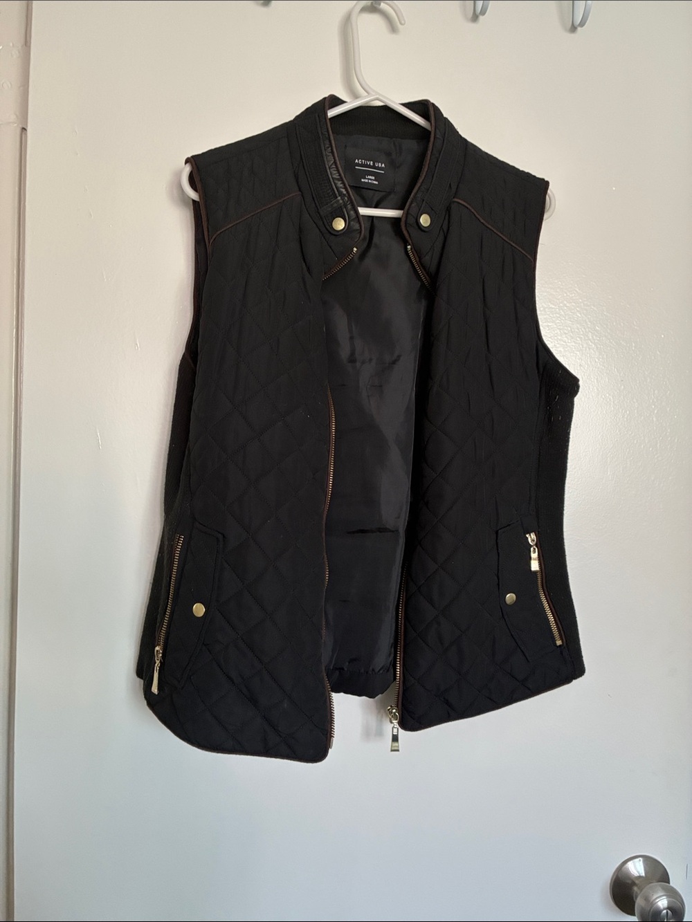 Quilted Black Sleeveless Vest with Gold Trim